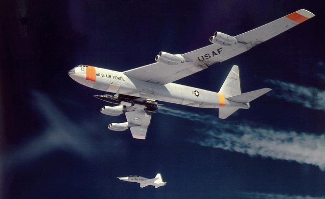 The X-15 slung underneath Balls 8, with a Northrop T-38 Talon chase plane alongside (NASA)
